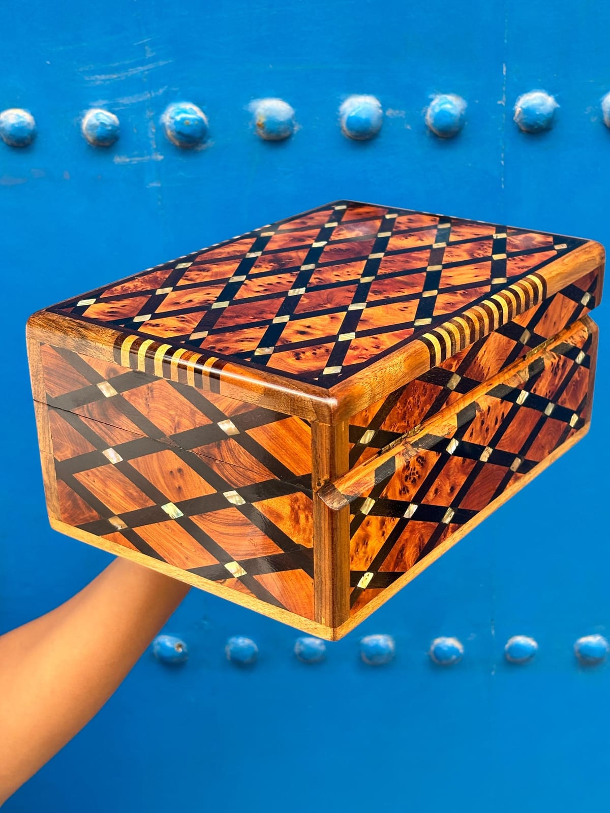 A solid thuya root burl box left unadorned, showing the wood's dense, swirling natural grain